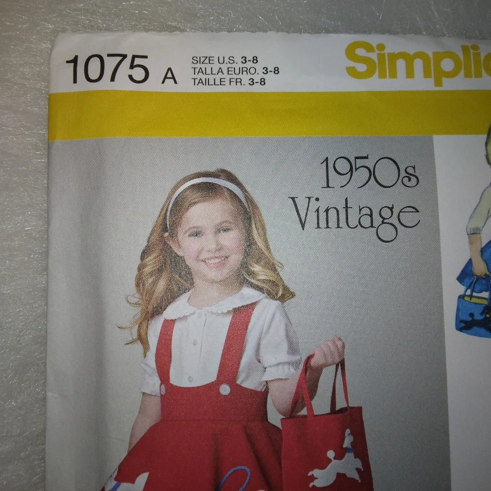 Simplicity 1075 Retro Child's jumper, skirt, and bag. 1950s
